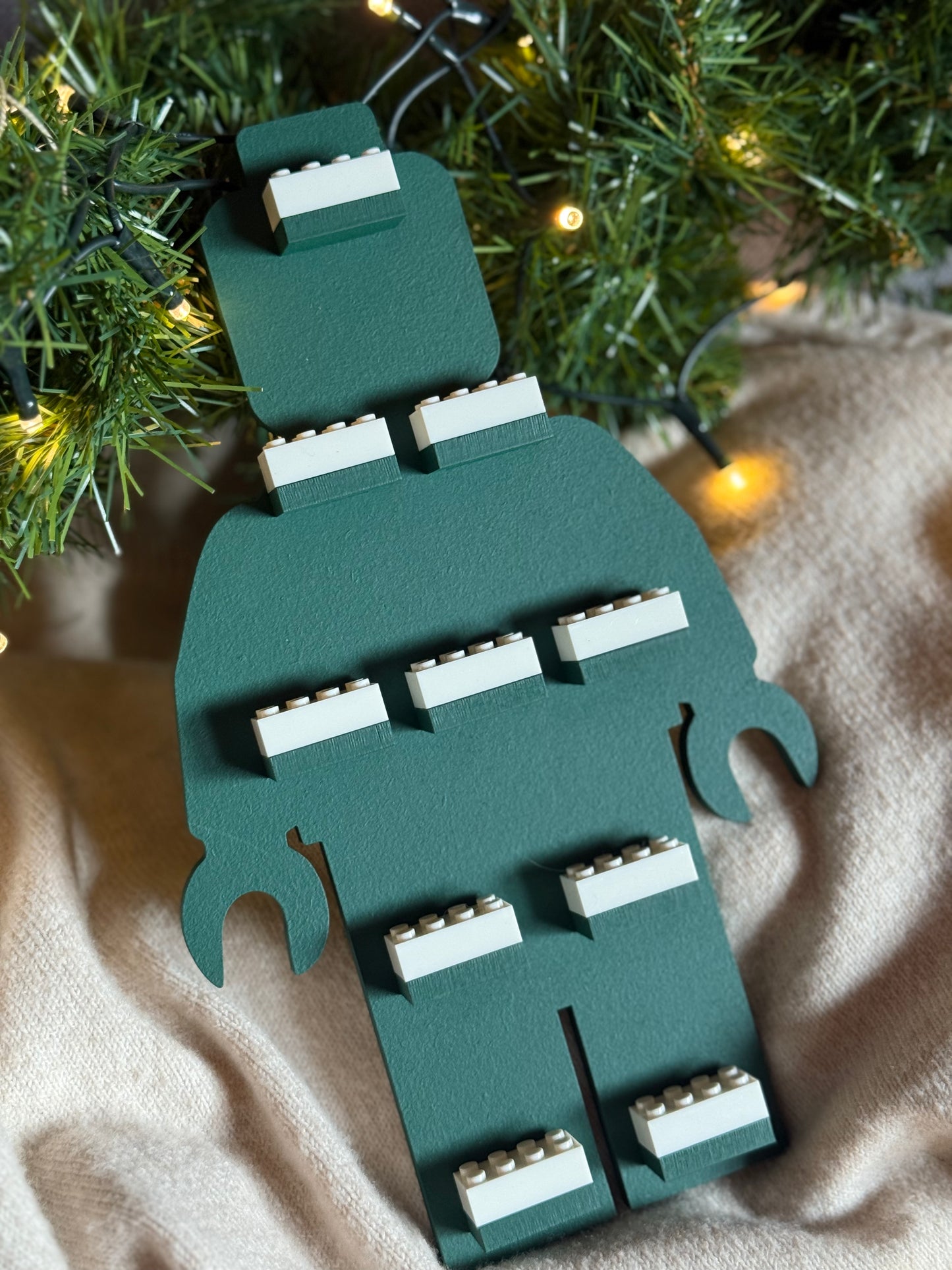 Figure-shaped shelf (compatible with LEGO®)